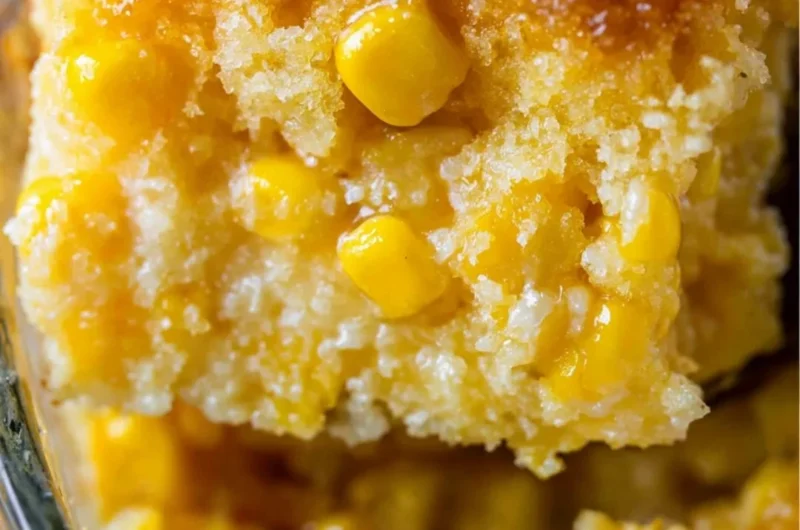 Delicious creamed corn casserole topped with golden brown corn and cheese.