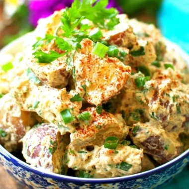 Delicious Creole Potato Salad served in a bowl with fresh ingredients