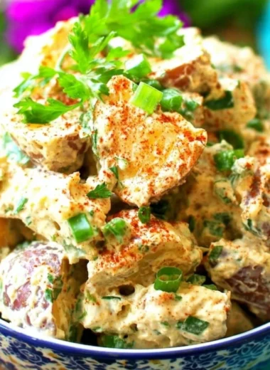 Delicious Creole Potato Salad served in a bowl with fresh ingredients