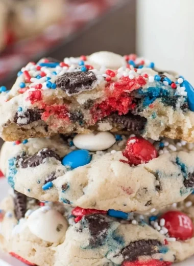 Colorful Fireworks Cookies and Cream Cookies topped with festive sprinkles.