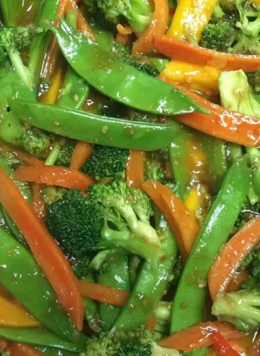 Colorful bowl of Ginger Veggie Stir-Fry with assorted vegetables and ginger