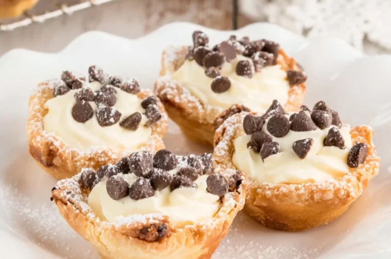 Delicious mini cannoli cups filled with creamy ricotta and topped with chocolate chips