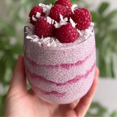 Delicious Raspberry Chia Pudding topped with fresh raspberries and mint.