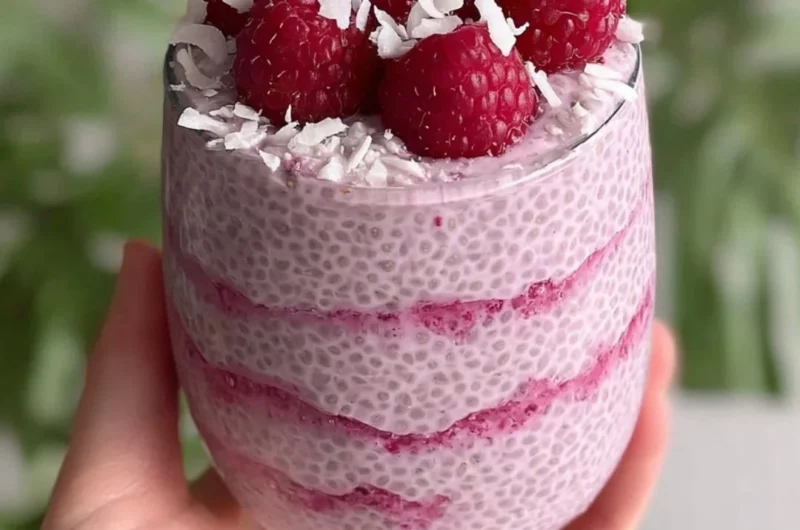 Delicious Raspberry Chia Pudding topped with fresh raspberries and mint.