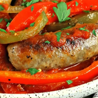 Slow Cooker Sausage and Peppers and Onions in a bowl