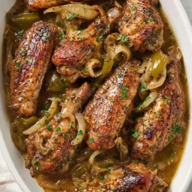 Deliciously seasoned baked turkey wings served on a plate
