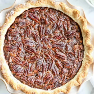 Delicious homemade chocolate pecan pie with a flaky crust and rich filling.
