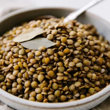 Bowl of perfectly cooked lentils with herbs and spices for a healthy meal