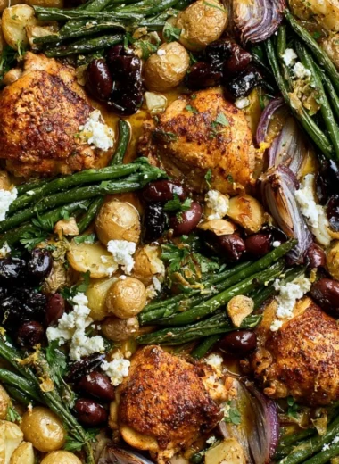 Delicious One-Pan Mediterranean Chicken with vibrant vegetables and herbs.