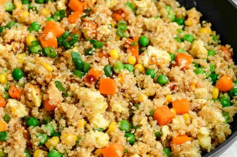 Quinoa fried rice with colorful vegetables in a bowl