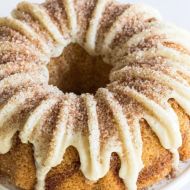 Delicious Snickerdoodle Bundt Cake topped with cinnamon and sugar