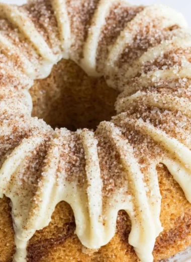 Delicious Snickerdoodle Bundt Cake topped with cinnamon and sugar
