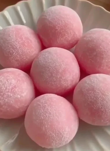 Delicious Strawberry Mochi dessert featuring sweet strawberries and chewy rice cake.