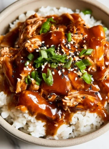 Crockpot Honey Garlic Chicken served with vegetables in a cozy setting.