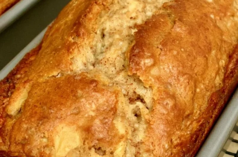 Delicious slice of cozy easy apple bread on a rustic wooden table