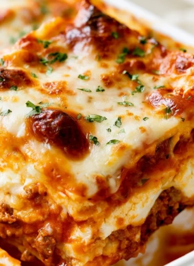 Cozy easy lasagna recipe with layers of pasta, cheese, and sauce
