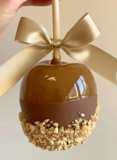 Delicious easy 5-ingredient caramel apples with shiny caramel coating.