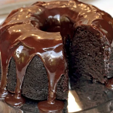 Famous Brick Street Chocolate Cake topped with chocolate frosting and decoration