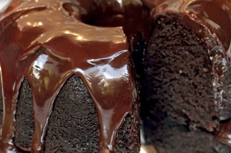 Famous Brick Street Chocolate Cake topped with chocolate frosting and decoration
