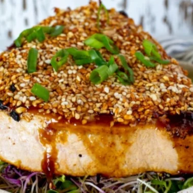 Sesame ginger grilled tuna steaks served with garnishes