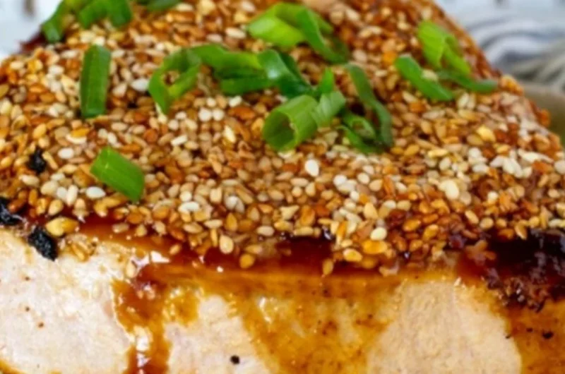 Sesame ginger grilled tuna steaks served with garnishes
