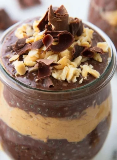 Healthy peanut butter chocolate chia pudding garnished with chia seeds.