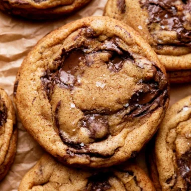Plate of cozy chewy pumpkin chocolate chip cookies with chocolate chunks