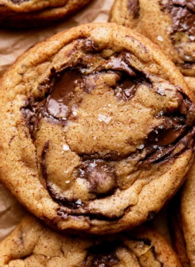 Plate of cozy chewy pumpkin chocolate chip cookies with chocolate chunks