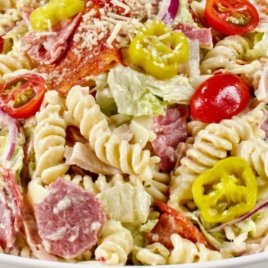 Cozy Grinder Pasta Salad with fresh vegetables and dressing