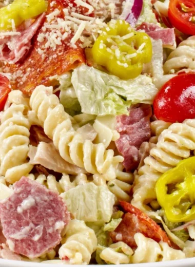 Cozy Grinder Pasta Salad with fresh vegetables and dressing