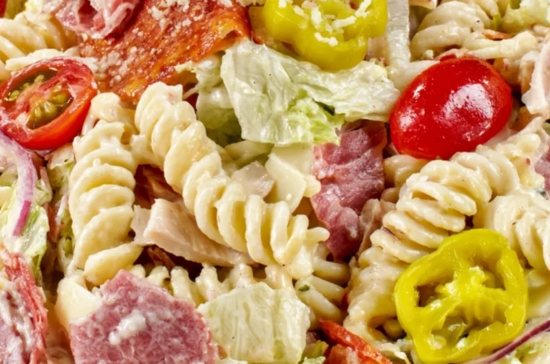 Cozy Grinder Pasta Salad with fresh vegetables and dressing