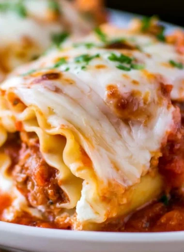 Delicious cozy lasagna roll ups baked with cheese and marinara sauce