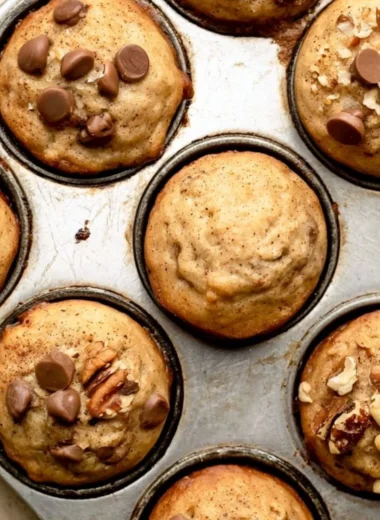 Cozy mini banana muffins fresh out of the oven, golden and delicious.