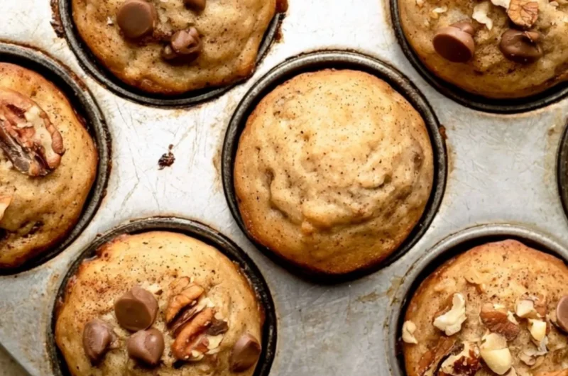 Cozy mini banana muffins fresh out of the oven, golden and delicious.